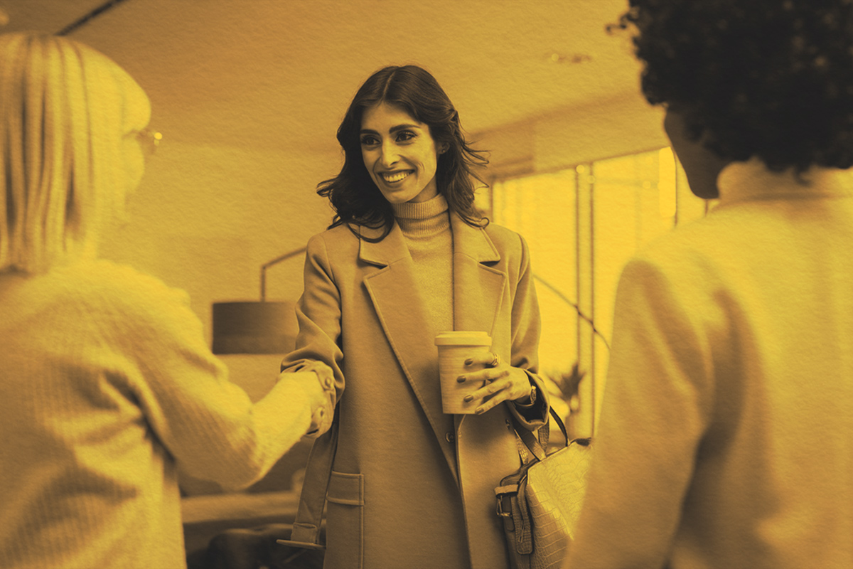 A woman introducing herself to colleagues