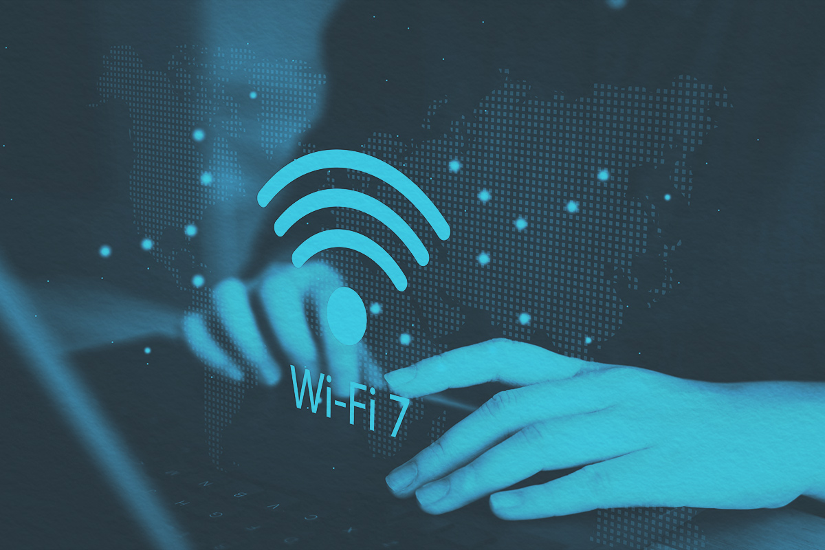 person using computer laptop with Wi-Fi 7