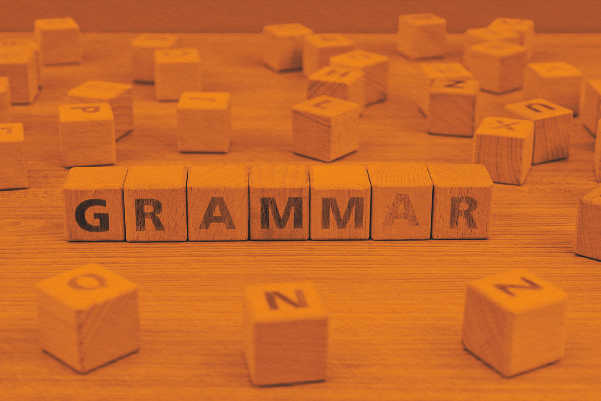 Wooden blocks spelling out the word grammar