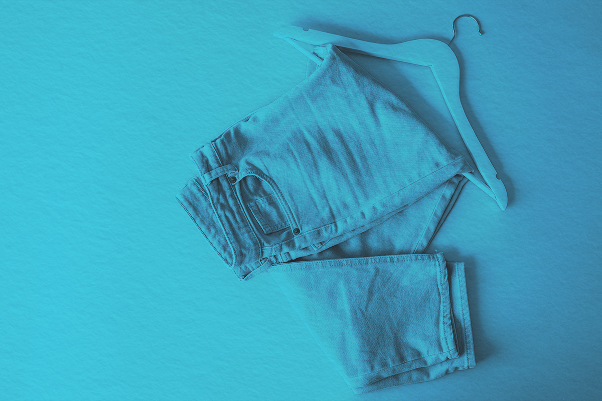 A pair of pants with a white hanger