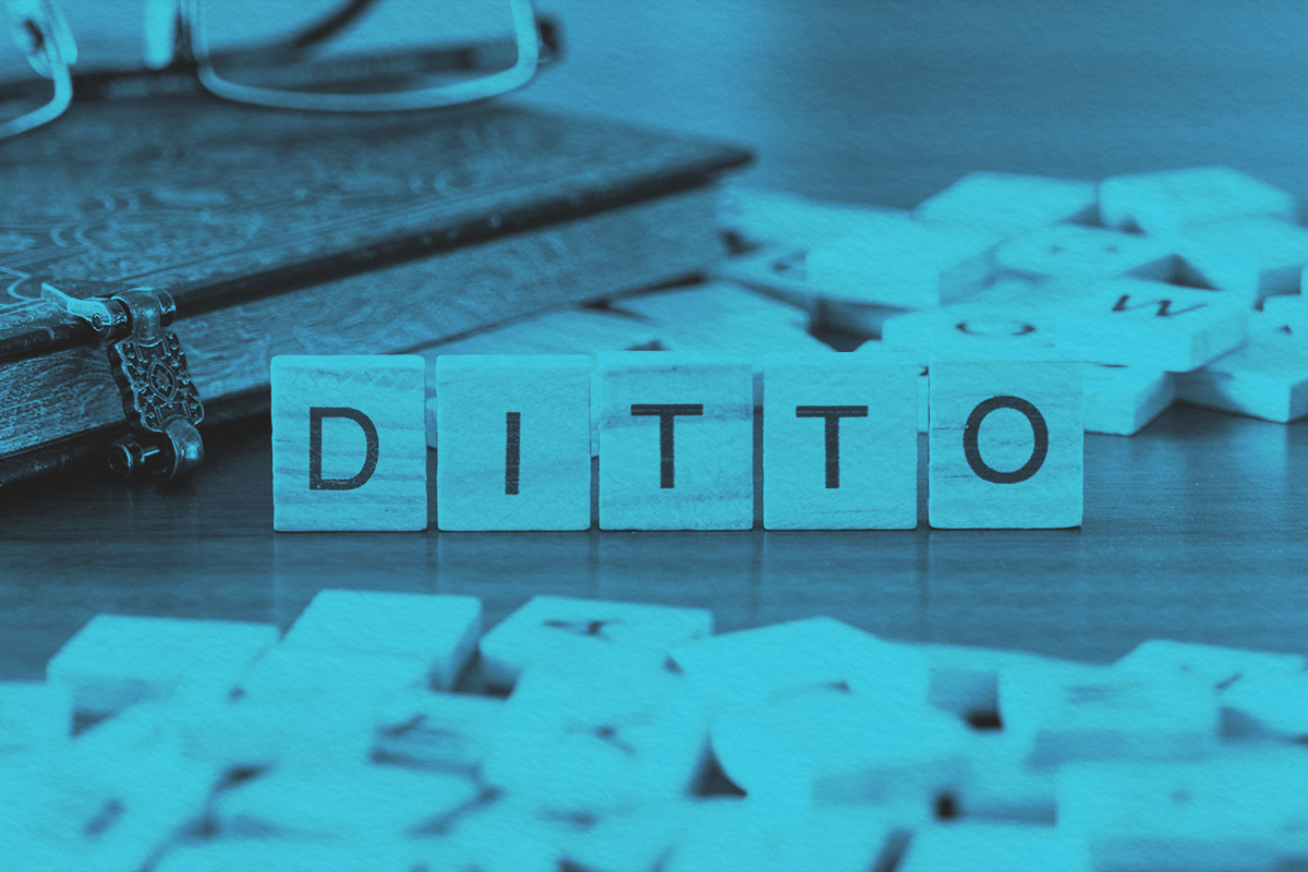 ditto word represented by wooden letter tiles