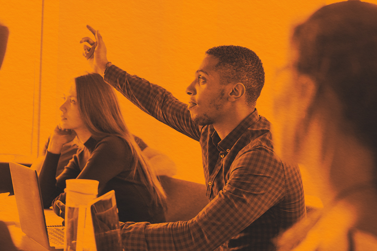 Student Asking Question Whilst Attending Lecture