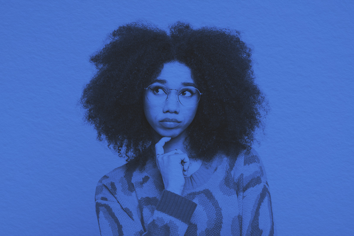 Portrait of thoughtful gen Z young woman