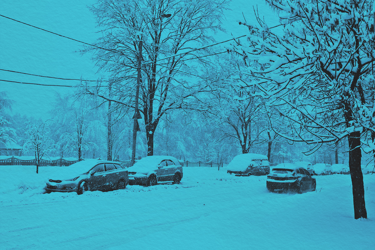 Cars on the road in the snowfall