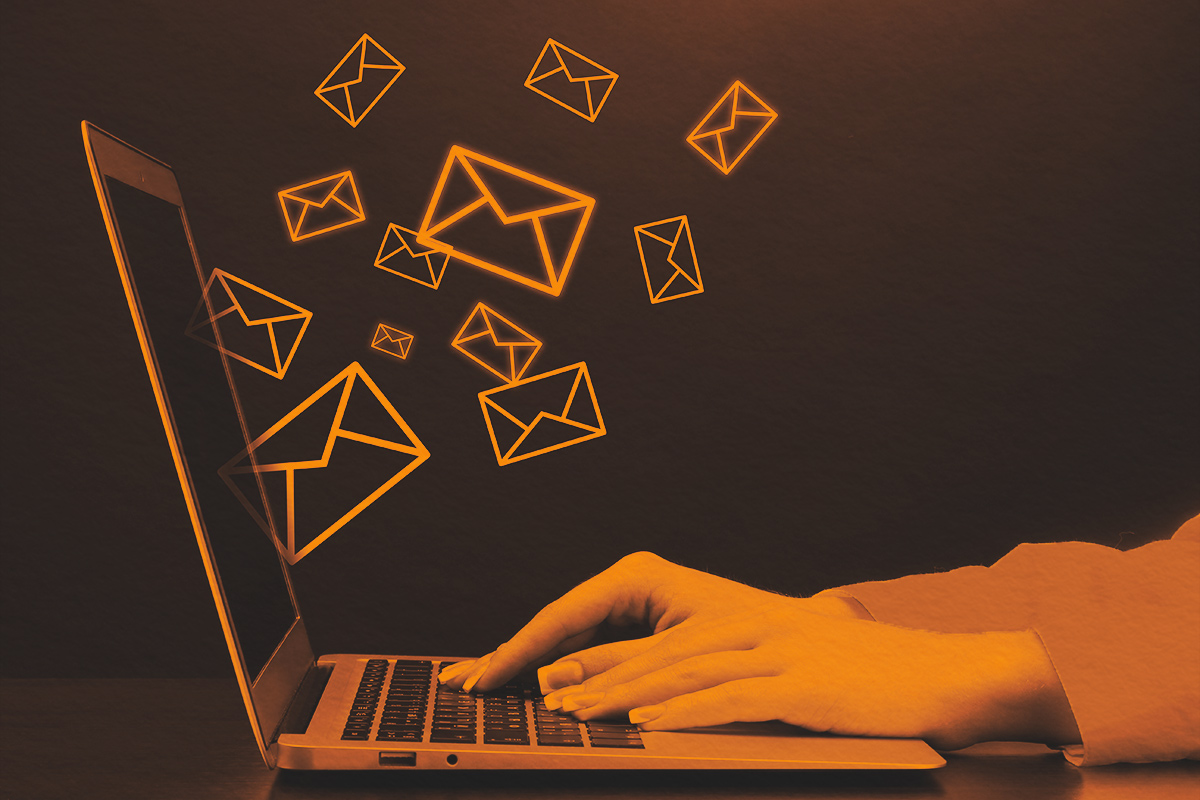 Typing on computer sending and receiving emails concept