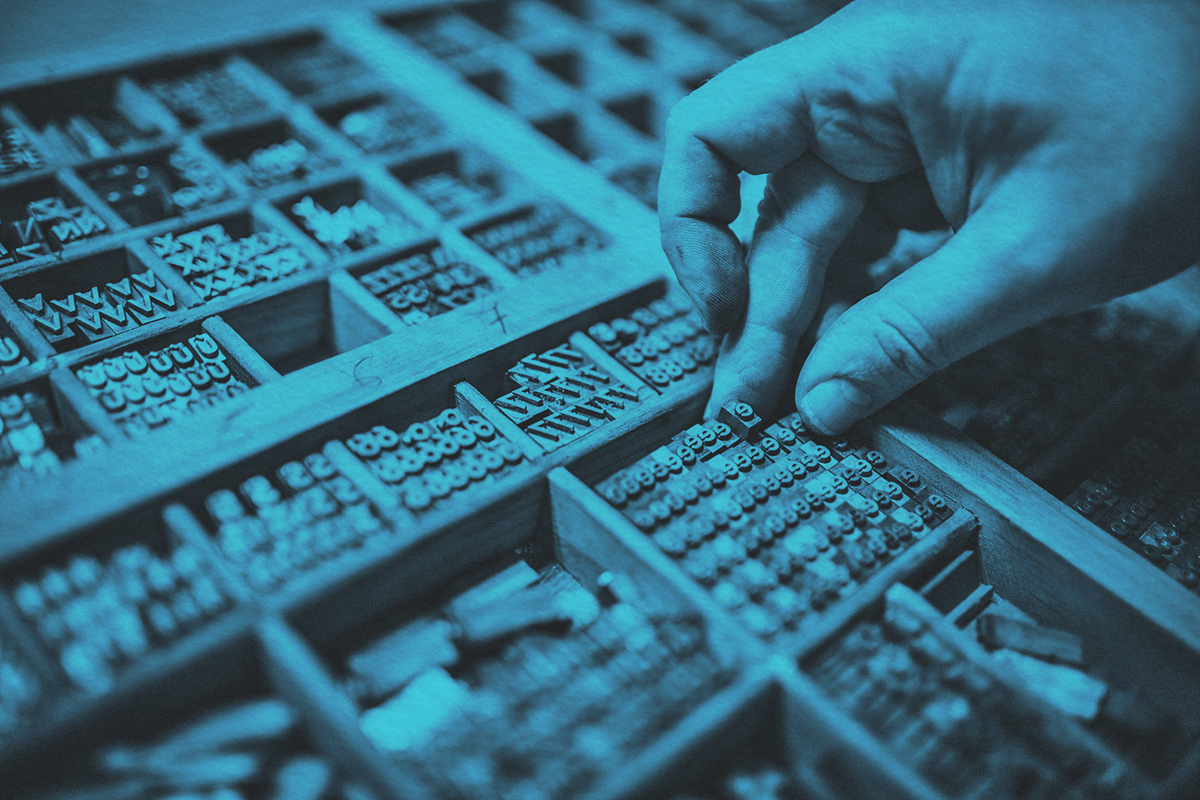Composing movable type for Letterpress Printing.